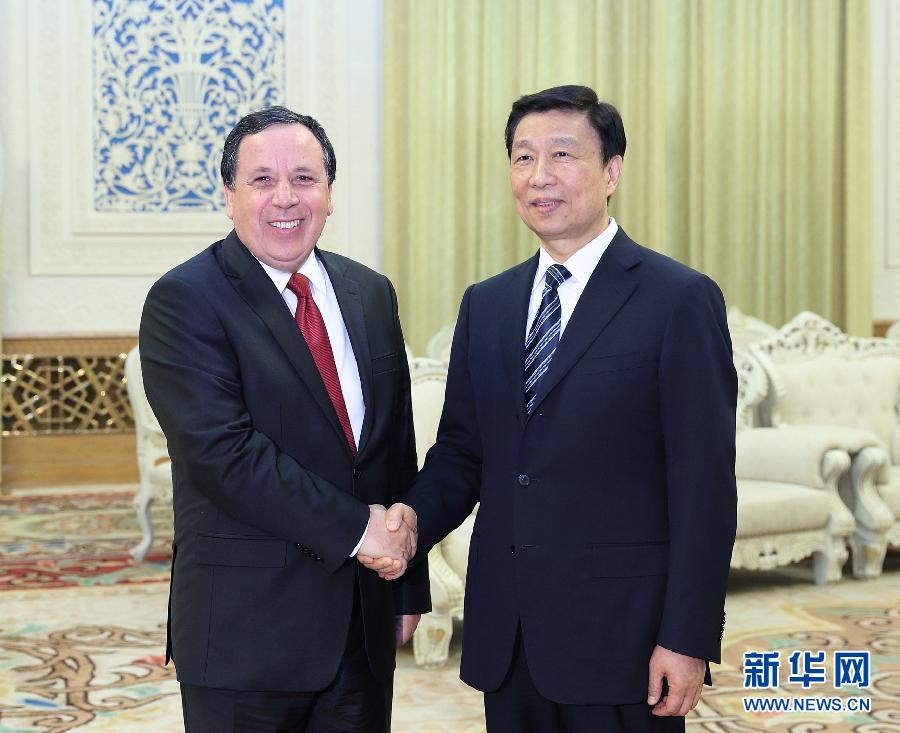 7月20日，國(guó)家副主席李源潮在北京會(huì)見突尼斯外長(zhǎng)杰希納維。新華社記者王曄攝