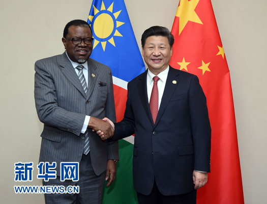 12月4日，國(guó)家主席習(xí)近平在約翰內(nèi)斯堡會(huì)見納米比亞總統(tǒng)根哥布。 新華社記者 張鐸 攝